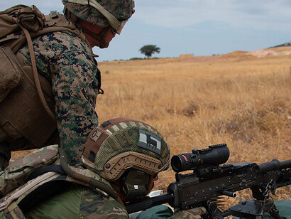 A Spanish soldier fires an M240B machine gun during a joint exercise in Ronda, Spain, on September 4, 2019. U.S. Marines from SPMAGTF-CR-AF trained with Spanish forces to enhance crisis response and interoperability, supporting regional stability through exercises across Europe and Africa