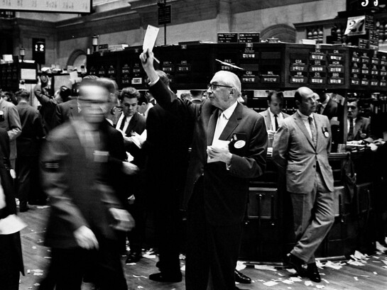 Stockbrokers working on the trading floor of the New York Stock Exchange, a global symbol of American market capitalism. September 23, 1963