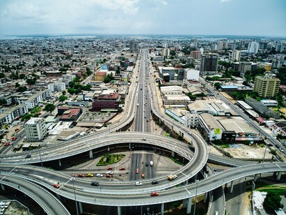 The sweeping highways of Abidjan, reflecting the infrastructure demands of Africa’s expanding urban economies