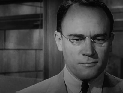The black-and-white cinematography of 12 Angry Men enhances the film’s atmosphere of moral and ethical conflict