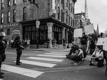 A Black Lives Matter protest unfolds on the streets of Nashville on June 4, 2020, as demonstrators march past buildings under the watchful presence of police, USA