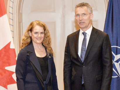 NATO Secretary General and a colleague
