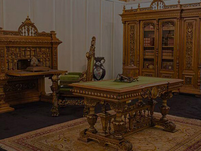 The famous study desk of Abdulhamid II. In Beylerbeyi Palace: Three drawers are made on the left side of the table and are hidden; from the outside, it is difficult to understand that there are three drawers on each side of the table. You can open the first drawer with a hidden button skillfully placed between the carvings that look like part of the pattern. The second drawer can only be pulled by touching a hidden part under it after opening the first drawer. There is also a special-shaped mirror embedded in the centre of the table to see who is passing behind you or standing on the right and left