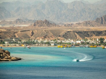 A tranquil view of Sharm el-Sheikh along the Red Sea, representing the fragile stability of key trade corridors