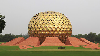 Auroville is an "experimental" city, an "intentional community" based on the vision of Sri Aurobindo (Matrimandir, Auroville, Pondicherry, India)