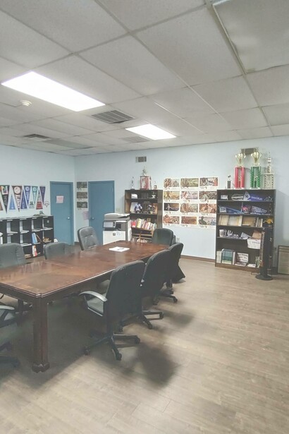Book shelves visible in board room of Punta Gorda City Council, Florida, USA
