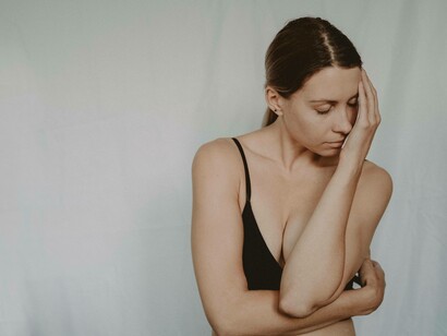 A woman not feeling free from her captive who is making her feel awkward