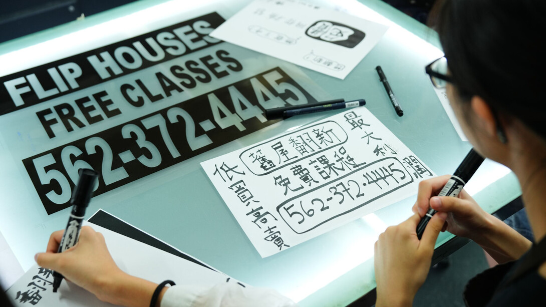 Students in Education lab exploring Mark Bradford’s Merchant posters, Hong Kong, 2024. Courtesy of Hauser & Wirth Gallery. Photo by Ivan Chan 