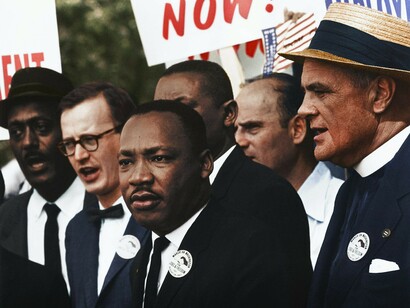 Dr. Martin Luther King, Jr. and Mathew Ahmann in a crowd of demonstrators at the March on Washington, US, 1963