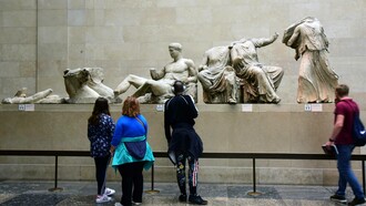 Visitors at the British Museum admiring the Parthenon Marbles