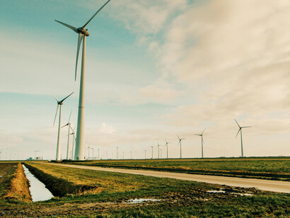 A scenic view of wind turbines generating renewable energy in a rural Dutch landscape, Uithuizermeeden, Groningen, Netherlands