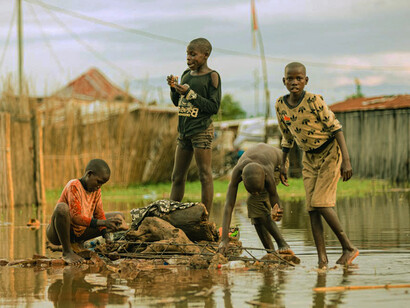 These boys embody the potential of mobile banking to uplift entire communities, signaling a shift towards a more inclusive and accessible financial landscape in Africa's rural heartlands