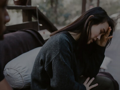 A couple had a fight, the woman is crying