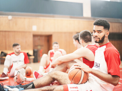A group of five college basketball players talk about the game and strategy