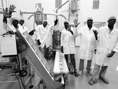 Workers operate on the production floor of Meds & Food for Kids in Cap-Haïtien, Haiti (2012)