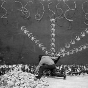 Robin Rhode, Four Plays (detail), 2012-2013, black & white print, 16 parts, each: 16.375 x 24.25 x 1.5 inches (framed), 41.6 x 61.6 x 3.8 cm, Overall dimensions: 71.81 x 103.31 x 1.5 inches, 182.4 x 262.4 x 3.8 cm, Edition of 5