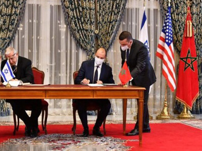 The signing of the diplomatic agreements between Morocco and Israel