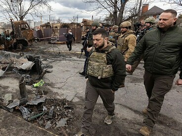 President Volodymyr Zelensky and Andriy Yermak, head of the Presidential Office, in Bucha, April 2022. Under the author’s framework, Ukraine would lift martial law and hold elections, and the new parliament would ratify the settlement
