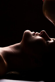 Shirodhara oil therapy, a soothing Ayurvedic treatment, performed in an Indian spa to promote deep relaxation and inner balance