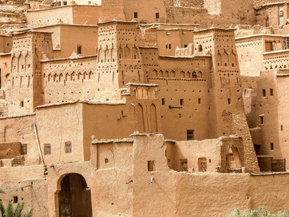 The weathered façade of a kasbah in Aït Benhaddou, reflecting the permanence of Morocco's historical identity