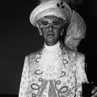 Diane Arbus, Masked man in white, N.Y.C. 1967 © The Estate of Diane Arbus