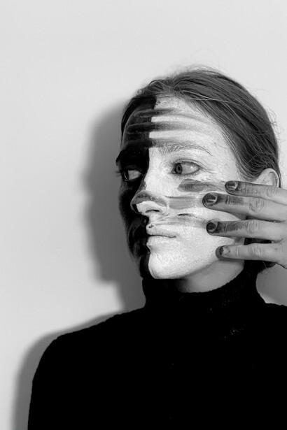 A person showing their different faces 
