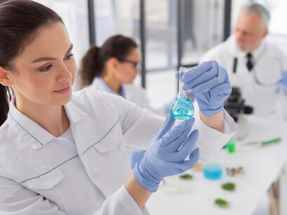 Scientists handling chemical substances highlight the role of science communication in research and development, with scientific advisors ensuring their work reaches and benefits the public