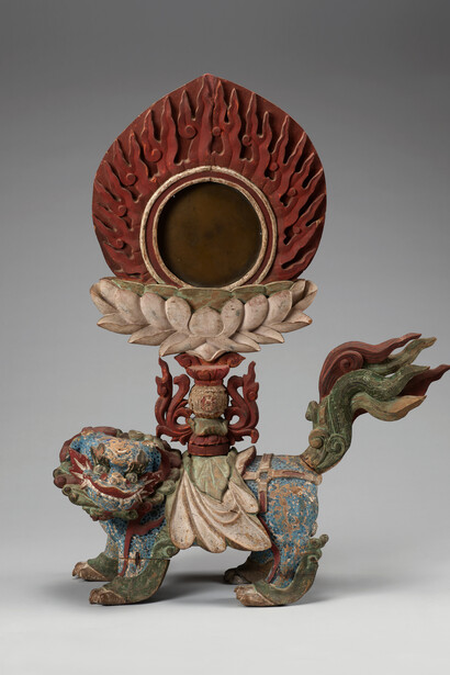 Karma mirror on lion-shaped pedestal, 1600-1700. Courtesy of British Museum