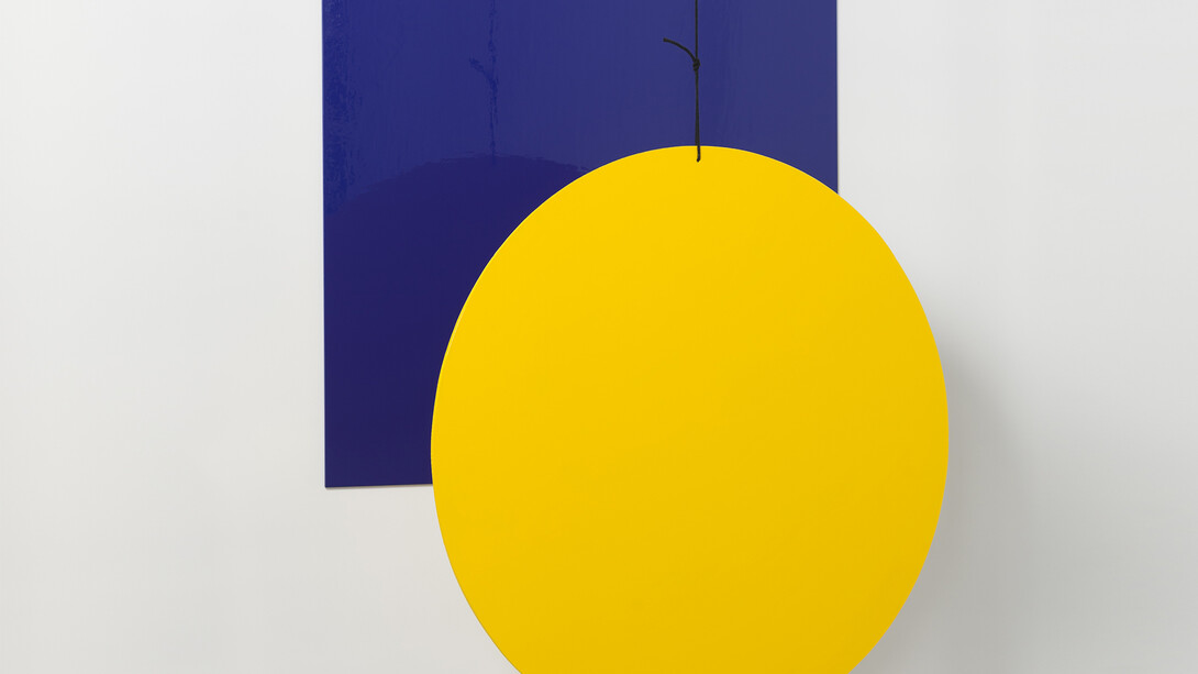 Camilla Løw, Vertical Sun, 2014, Hand painted in enamel on aluminium & cord, 63 cm x variable height