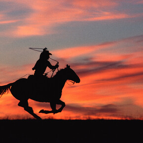 Norm Clasen, Sunset chase, Riverton, WY, 1985. Courtesy of M+B