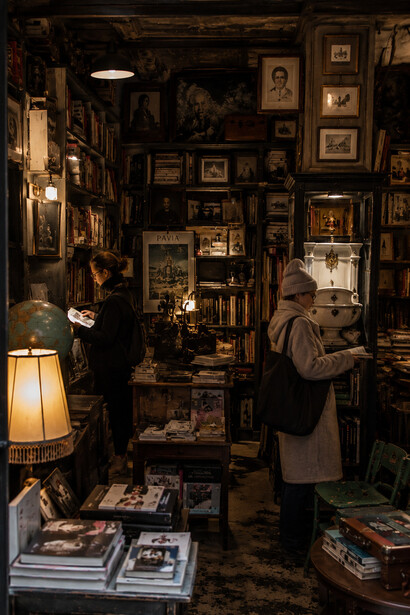 Antique-filled independent bookshop where shelves of carefully selected books meet reclaimed furniture and vintage treasures