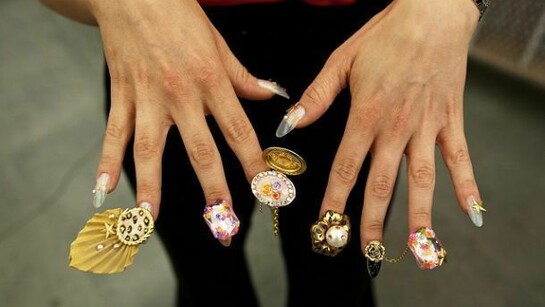 Dzine (Carlos Rolon), Get Nailed at the New Museum, 2011. Public intervention and performance. Photo: Chris Mosier, courtesy of the artist, Salon 94, New York, and Paul Kasmin, New York