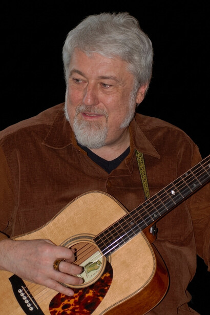 Marcello Capra in performance, reflecting his enduring passion for guitar and composition