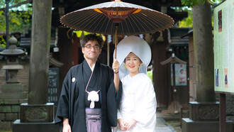 Posing outside Hikawa shrine