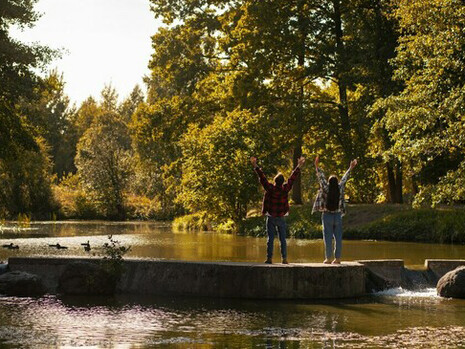 A couple relaxing in nature, embracing peace and experiencing spiritual awakening