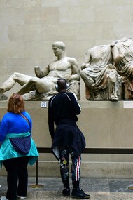 Visitors at the British Museum admiring the Parthenon Marbles