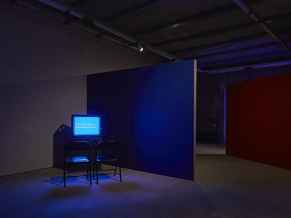 Installation view of Tony Cokes, Evil.35: Carlin/Owners, 2012 at Goldsmiths CCA. Courtesy the artist, Greene Naftali, New York, US, Hannah Hoffman, Los Angeles, US, and Electronic Arts Intermix, New York, US. Photographer Andy Stagg