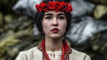 Giorgio Bianchi, Funeral in Kiev: A woman prays in front of a makeshift memorial set up to commemorate those killed in clashes on February 20.