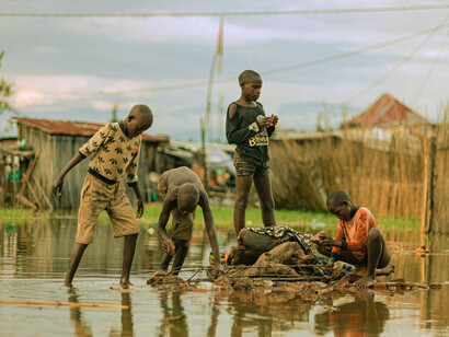 Amidst the backdrop of rural life, these boys represent the next generation eager to embrace digital finance, marking a shift towards financial inclusion in traditionally underserved regions