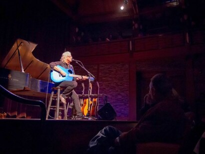 Arlo Guthrie. Photographie Marv Goldschmitt