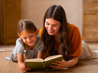 A mother reading stories to her child, signifying how it is an important bonding activity and can create lasting memories