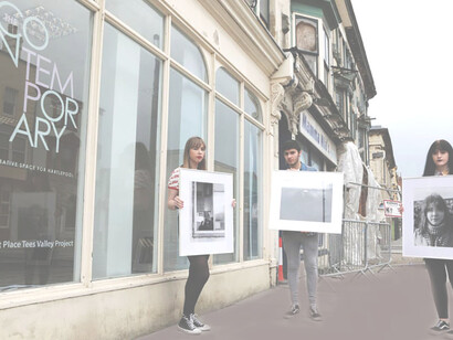 Photography students from the Northern School of Art preparing for a show of their work at former empty retail space in Cleveland 2019