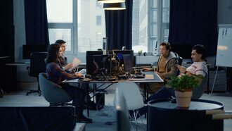 Focused and collaborative, the team navigates the complexities of developing an effective information system tailored to their evolving needs