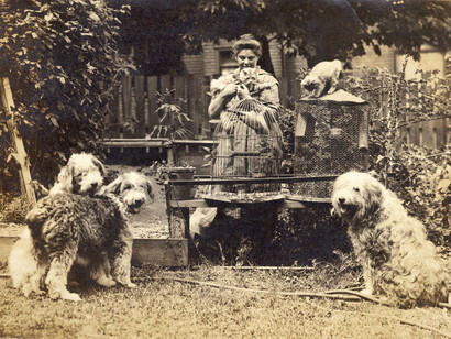 Emily Carr and pets in her garden at 646 Simcoe Street, Victoria, British Columbia, c. 1918. Image C-05229, courtesy of the Royal BC Museum, BC Archives