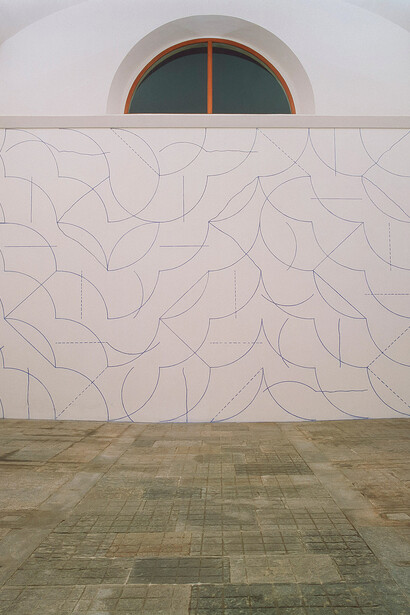 Sol LeWitt, Wall Drawing #146A, 1972, ink on wall, executed by assistants. Sol LeWitt's Wall Drawing #146A, created in 1972, is a work composed of "All two-part combinations of arcs from corners and sides, and straight, not straight, and broken lines within a 36-inch (90 cm) grid". This drawing is a prime example of LeWitt's approach, where the idea and instructions for the artwork exceed the physical execution by his proxies. The specific medium for this drawing is ink on wall