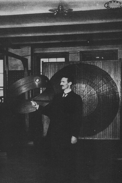 Nikola Tesla demonstrates “wireless” power transmission in his Houston Street laboratory in March 1899