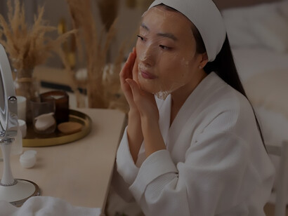 Explore the world of skincare essentials as a woman incorporates a luxurious face mask into her daily routine, unveiling the key to healthy, glowing skin