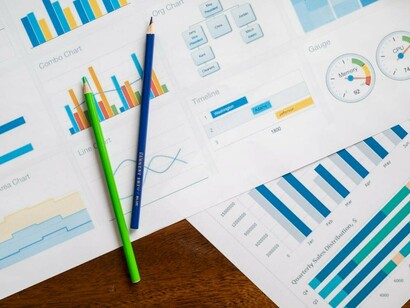 A bird’s-eye view of diverse charts and infographics highlighting data visualization, digital marketing, and brand storytelling