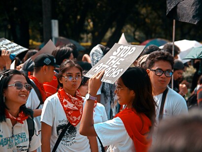 Protesters in the Philippines with colorful banners