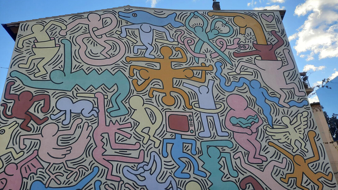 Keith Haring, Tuttomondo, opera di 180 metri quadrati realizzata sulla parete esterna della chiesa di Sant'Antonio Abate a Pisa